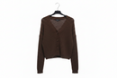 Brown cardigan on a hanger against a white background