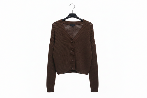 Brown cardigan on a hanger against a white background