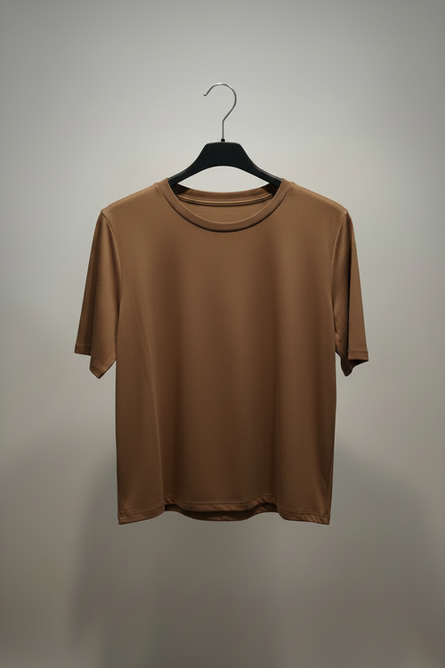Brown t-shirt on a black hanger against a plain background