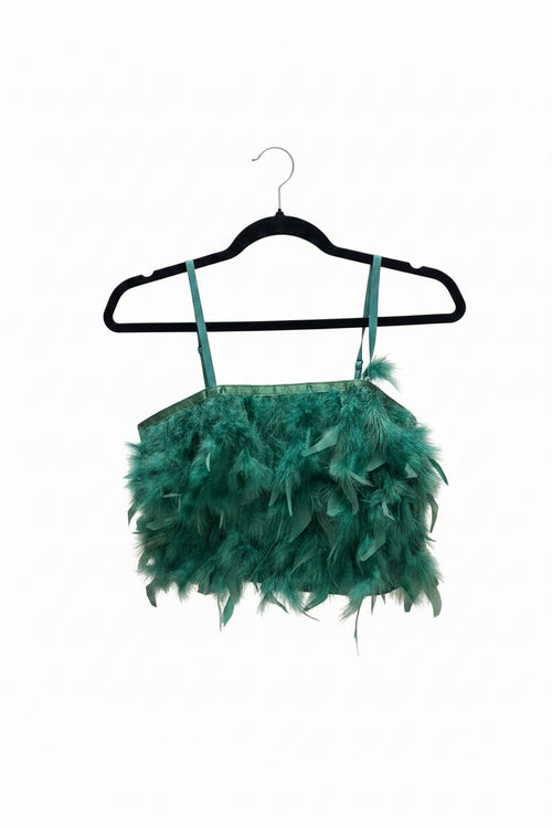 Green feathered top on a black hanger against a white background