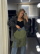 Girl holding Green macrame handbag 2