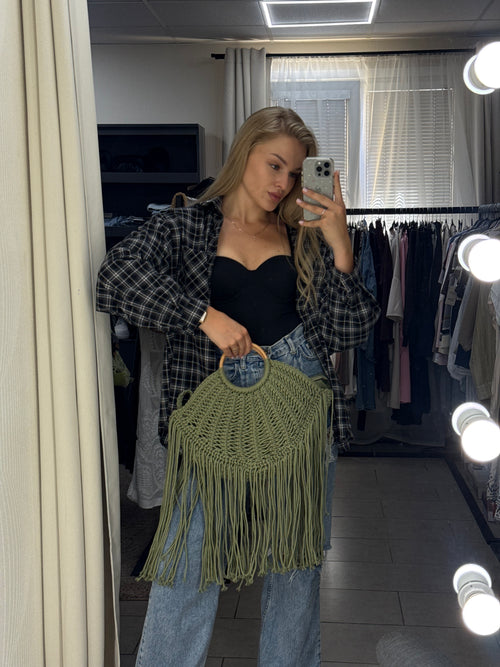 Girl holding Green macrame handbag 2