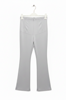 Light gray flared pants hanging from a white plastic hanger against a plain white background.