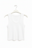 White tank top on a hanger against a white background