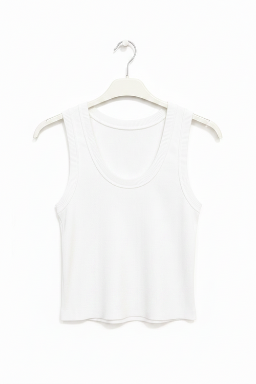 White tank top on a hanger against a white background